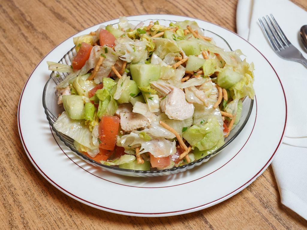 Chinese Chicken Salad · Contains Slines of Chicken Breast, Wontons, Cucumber,  Tomato,  Finely chopped onion, Parsley and Chinese style dressings.