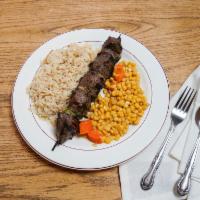Beef Kabob Skewer · 5 Cooked to order beef chunks with green bell peppers and yellow onions,  with one side, cor...