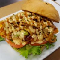 Caba Chicken Sandwich · Grilled chicken breast with lettuce, tomato, applewood smoked bacon, cheddar cheese, guacamo...