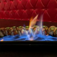 Fire Man Roll · Spicy tuna avocado inside top with seared yellowtail and jalapeno. Hot and spicy.