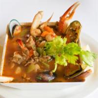 Cioppino Dinner · Seafood stew shrimp, lobster, clams, scallops, mussels, calamari, white fish, crab legs cook...