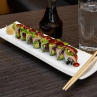 Spicy Girl roll · Black pepper tuna and avocado topped with yellowtail and avocado.