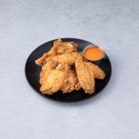 Hot Wings · Plump fried chicken marinated wings. 
Serving Options:
Wings with Sauce on side
Wings Tossed...
