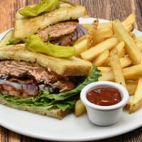 Blackened Salmon Blt · Applewood smoked bacon, tomato, lettuce, sourdough, dill caper aioli, french fries.