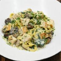 Chicken Fettuccini · Mushrooms, spinach, parmesan, white wine cream.