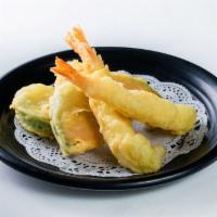 (g069) Tempura · Lightly battered and fried shrimp, sweet potato, pumpkin and zucchini.