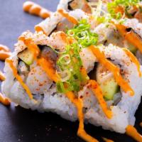 (e041) Spicy Scallop Roll · Eight pieces. Scallop, avocado and cucumber roll. Topped with spicy mayonnaise, chili powder...
