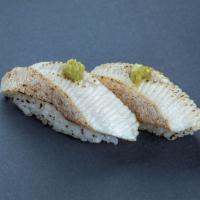 (b018) Aburi Yellowtail Sushi · Two pieces.