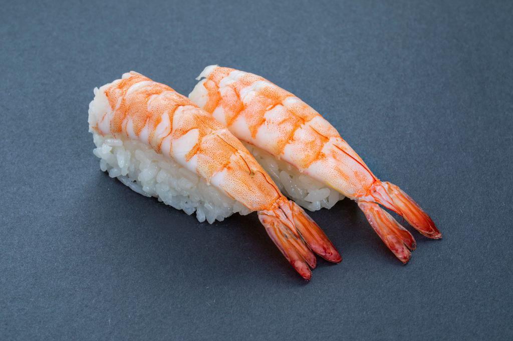 (b019) Shrimnp Sushi · Two pieces.