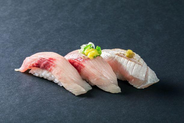 (b214) Yellowtail Sampler Sushi · Three pieces.