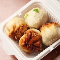 Pan Fried Soup Dumplings (4pc) · Sheng Jian Bao - Pork & Leek pan fried soup dumplings