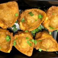 Crispy Sweet & Sour Pork Dumplings · Crispy fried pork dumplings, served with pineapple garlic pepper sweet & sour sauce