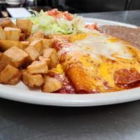 CHEESE ENCHILADAS PLATE · THREE CHEESE ENCHILADAS TOPPED WITH TEX MEX SAUCE MELTED WITH CHEDDAR CHEESE. SERVED WITH RI...