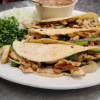 Chicken Fajita Taco · Served with grilled onions and bell peppers.
