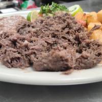 Barbacoa Plate · Barbacoa meat served with breakfast potatoes, refried beans, pico de gallo and 2 tortillas o...