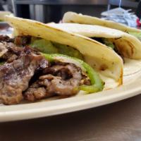 Monterrey Tacos · 3 tacos served on corn tortilla with monterrey jack cheese melted, grilled onions and bell p...