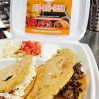 Gorditas Plate · 2 gorditas stuffed with shredded chicken breast ranchero style or picadillo, served with gua...