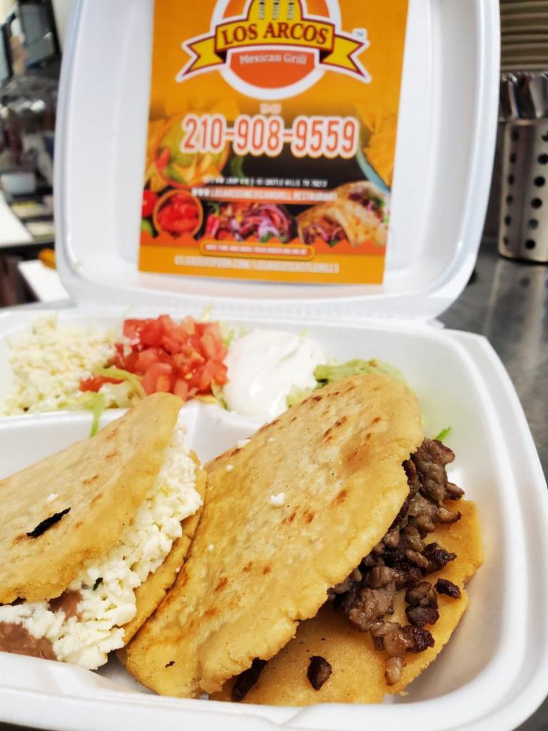 Gorditas Plate · 2 gorditas stuffed with shredded chicken breast ranchero style or picadillo, served with guacamole, sour cream, queso fresco, rice, refried beans and 2 tortillas on the side.