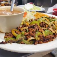 Pastor Plate · Pastor mixed with grilled onions and bell peppers, served with rice, refried beans and 2 tor...
