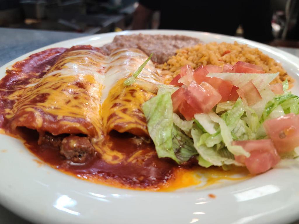 Cheese Enchilada Plate · 3 cheese enchiladas topped with tex mex sauce melted with cheddar cheese. Served with rice, refried beans and 2 tortillas on the side.