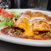 Beef Enchilada Plate · 3 beef enchiladas topped with tex mex sauce melted with cheddar cheese. Served with rice, re...