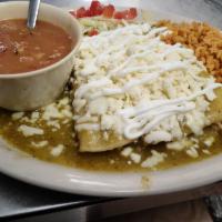 Chicken Enchilada Plate · 3 chicken enchiladas topped with tex mex sauce melted with cheddar cheese. Served with rice,...