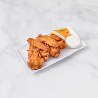 Chicken Wings · Dipped in your choice of sauce. Served with blue cheese dressing. 