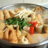 Fish Cake Soup · Soup with fried fish patties.