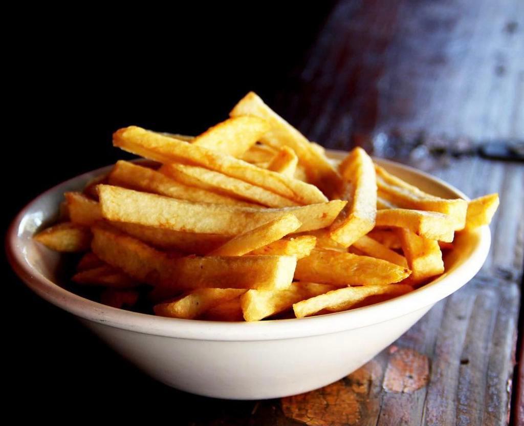 Housemade French Fries · Hand cut potatoes. Add garlic sauce for an additional charge. Vegetarian. Vegan. Gluten free.