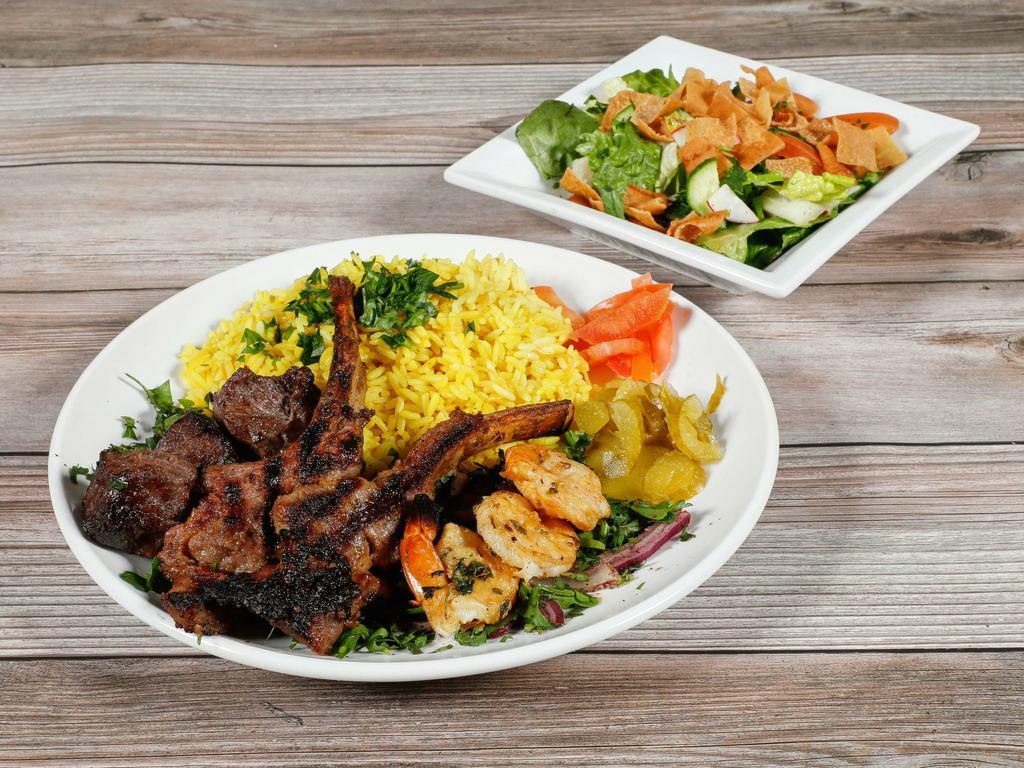 The Sultan Plate · Lamb chops, tiger shrimp, filet mignon, parsley, onion, sumac.