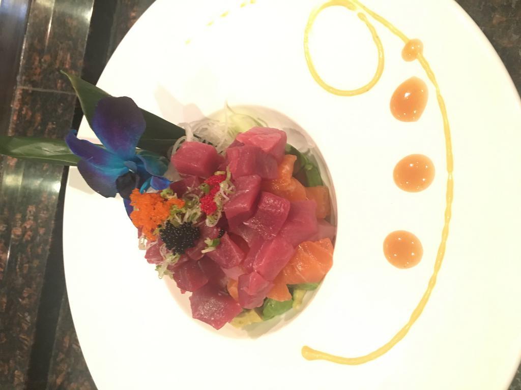 Seth Salad · Tuna, salmon, yellowtail, and vegetables with miso sauce.