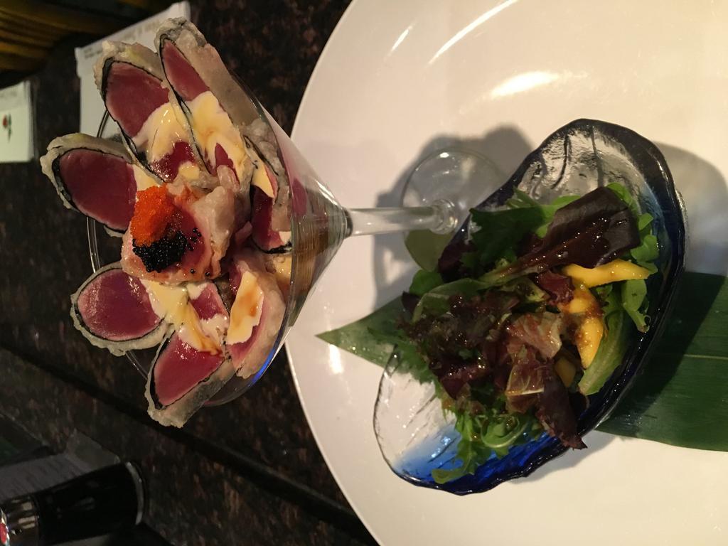Martini Tuna Salad · Crunchy tuna, cucumber, vegetable salad with special sauce. 