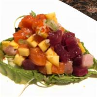 Valentine's Salad · Tuna, yellowtail, salmon, white fish and mango with sweet wasabi sauce.