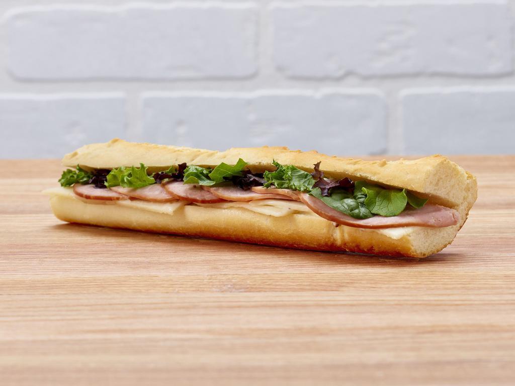 Pret's Famous Ham & Cheese Baguette · Sliced Niman Ranch Applewood Smoked ham (antibiotic-free), Swiss cheese, and mesclun with whole grain mustard mayo, on a freshly baked baguette.