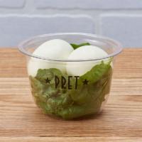 Egg & Spinach Pot · Two hard-boiled eggs nestled on a bed of spinach, for a protein-packed hit at any time of th...