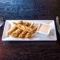 Crispy Pickles · Pickle spears hand battered to order and flash fried, served with habanero ranch.