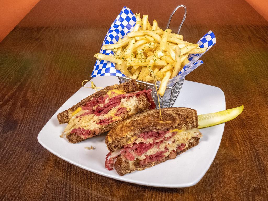 Hot Pastrami Sandwich · Warm pastrami, melted Swiss cheese topped with homemade sauerkraut and house mustard on marble rye.