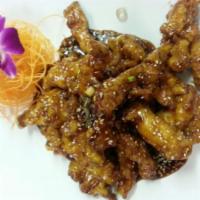 87. Sesame Chicken · Crispy white meat chicken sauteed with our tasty sesame seed sauce.