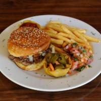 Mexican Burger · 1/2 ground beef, 1/2 chorizo patty topped with chihuahua cheese, crispy bacon, lettuce and g...