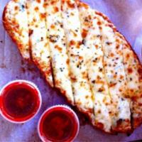 Cheese Bread · Deliciously baked sourdough bread, generously layered with fresh mozzarella.