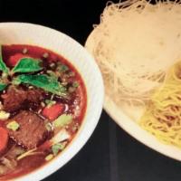 16. Beef Stew with Noodles · Beef Stew Served with Beansprouts, Yellow Onion, Green Onion, Cilantro.
Choice of Rice  Nood...