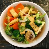 46. Tofu Rice Noodle Soup · Mixed Vegetables, Tofu, Yellow Onion, Green Onion, Cilantro in Veggie Broth