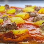Forever Royal Pizza · All beef pepperoni, Italian sausage, and fresh pineapple.