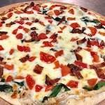 Chicken Bacon Ranch Pizza · Homemade ranch, chicken, bacon, spinach, and tomatoes.
