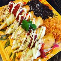Chicken Flautas · Rolled flour tortillas filled with chicken, pepper jack cheese and veggies then lightly frie...