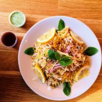 Veg Biryani · Sweet and savory veggies slow cooked in basmati rice.