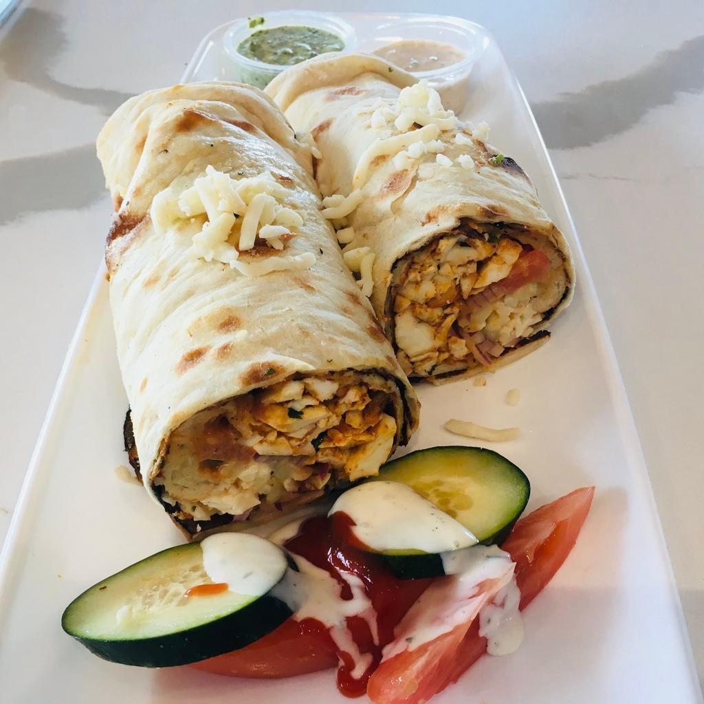 Paneer Wrap · Indian cottage cheese or paneer, tossed with onion, pepper and sauces wrapped in a soft bread (naan). Great for on-the-go meals and can be enjoyed in any weather.