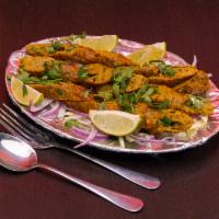 Tandoori Chicken · Tender bone-in chicken, marinated with exotic tandoori spices.