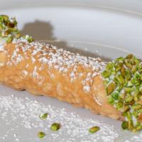 Cannoli Dream · Tube-shaped shell of fried traditional pastry dough, filled with a sweet, creamy ricotta fil...