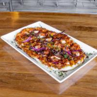 Fred’s Special Flatbread · Marinara, chorizo, spicy linguica, grilled chicken breast red onion, and sharp cheddar and m...